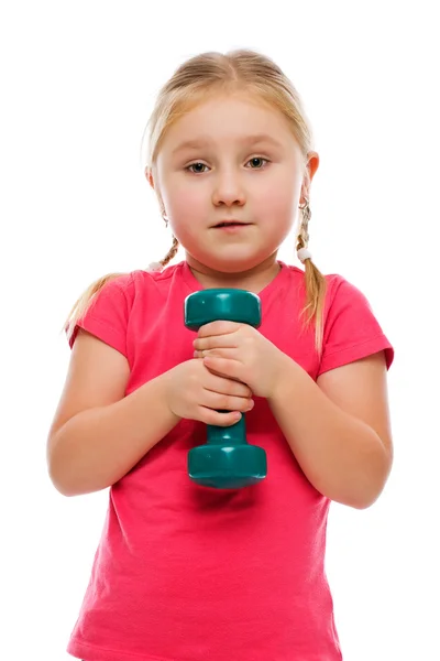 Kleines Mädchen mit Hantel. — Stockfoto