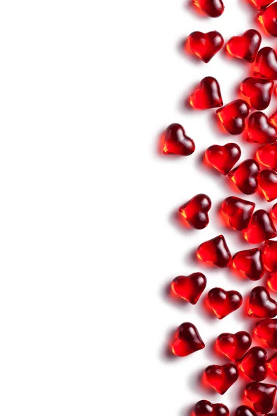 Red glass hearts on white background — Stock Photo, Image