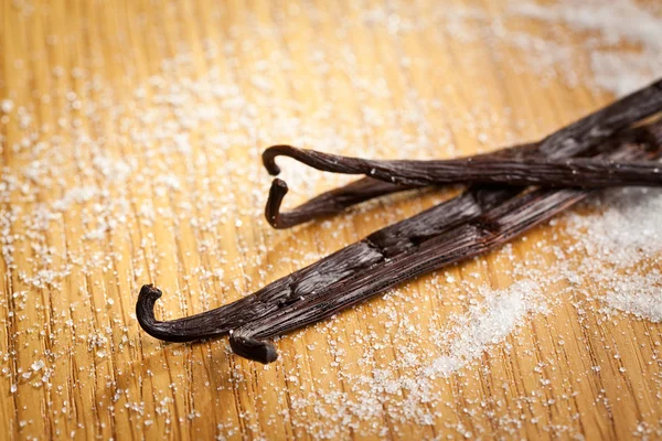 Vanilla pods and sugar — Stock Photo, Image