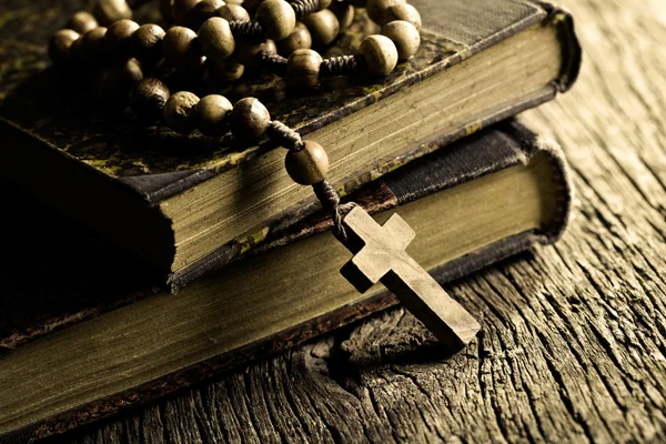 Rosary beads on old books Royalty Free Stock Photos