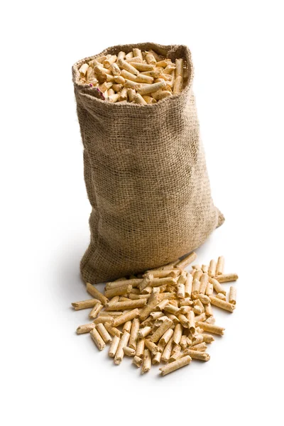 Wooden pellets in jute sack — Stock Photo, Image