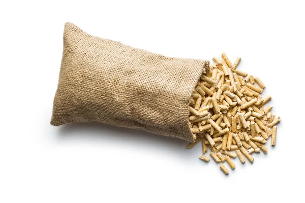 Wooden pellets in jute sack — Stock Photo, Image