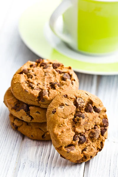 Chocolate cookies on kitchen table — Stock Photo, Image