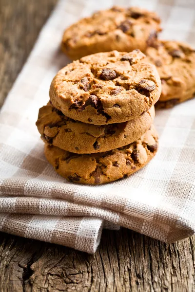 Chocolate cookies on kitchen table — Stock Photo, Image