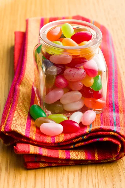 Jelly beans in glass jar — Stock Photo, Image