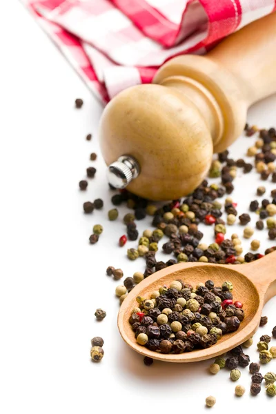 Pepper and wooden pepper mill — Stock Photo, Image
