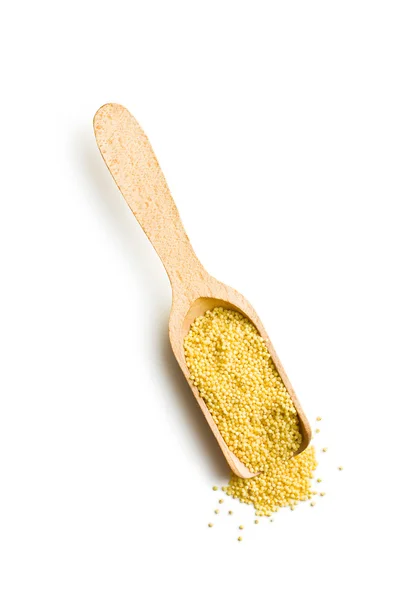 Millet in wooden scoop — Stock Photo, Image