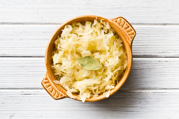 Sauerkraut in ceramic bowl — Stock Image Sauerkraut in ceramic bowl Stock Photo