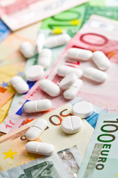 Pills and euro banknotes — Stock Photo, Image