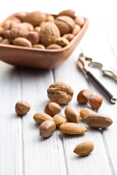 Various unpeeled nuts — Stock Photo, Image