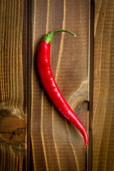 Peperoncino su sfondo di legno — Foto Stock