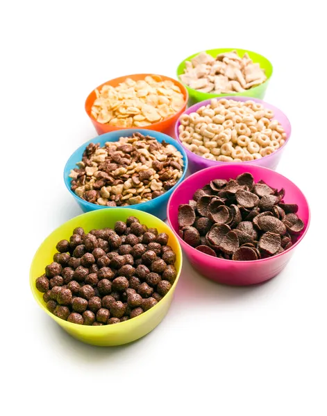 Varios cereales para niños en cuencos de plástico — Foto de Stock