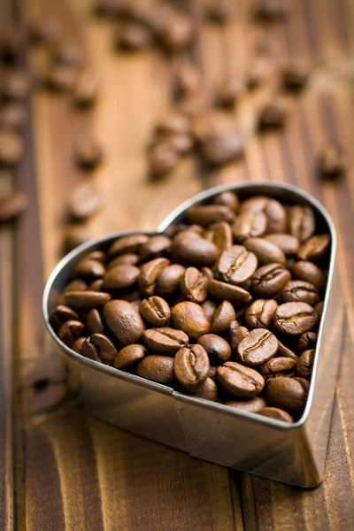 Coffee beans in heart form — Stock Photo, Image