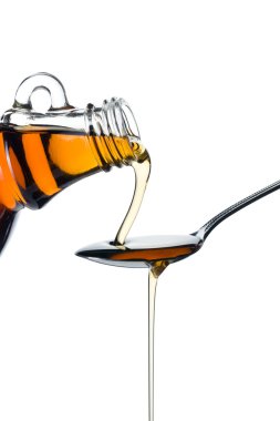 maple syrup pourin on spoon clipart