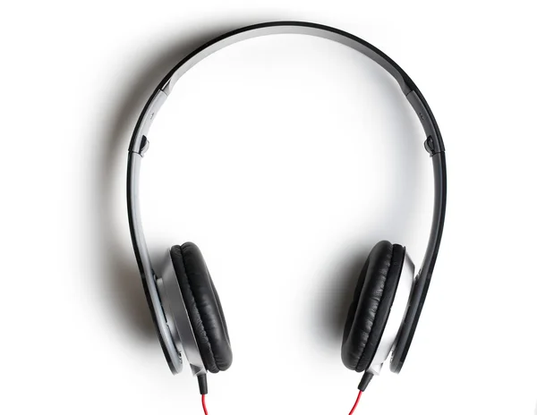 Black headphones on white background — Stock Photo, Image