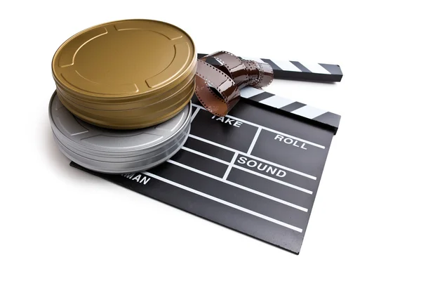 Tablero de aplausos con carretes de película — Foto de Stock