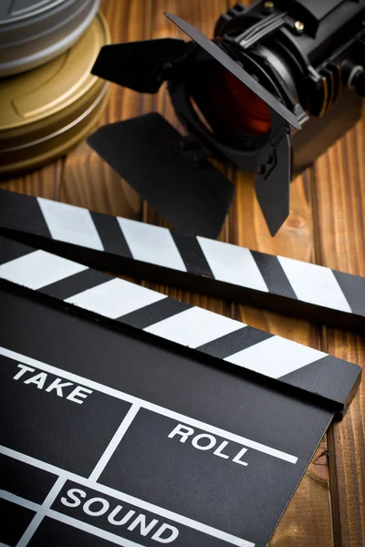 Clapper board with movie light — 图库照片