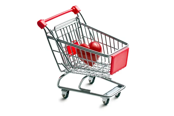 Carrito de compras con corazón de piedra — Foto de Stock