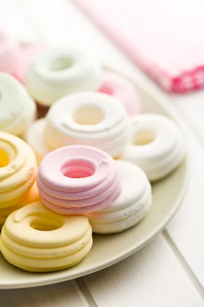 Colorful meringues on plate — Stock Photo, Image