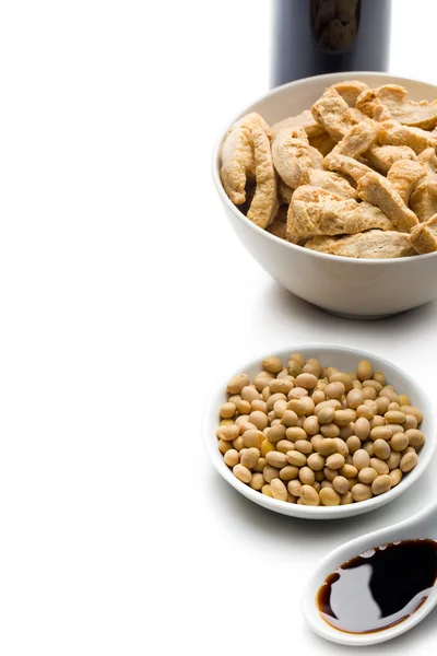 Soybeans, soy meat and soy sauce Royalty Free Stock Images