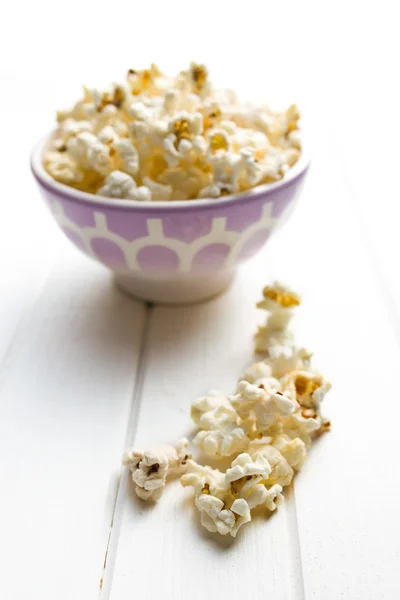 Popcorn on table — Stock Photo, Image