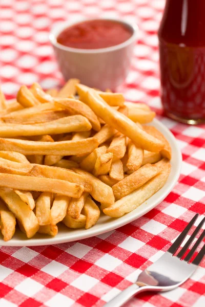 French fries on plate with ketchup — Stock Photo, Image