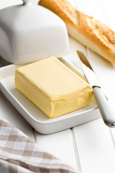 Cube of butter with bread — Stock Photo, Image