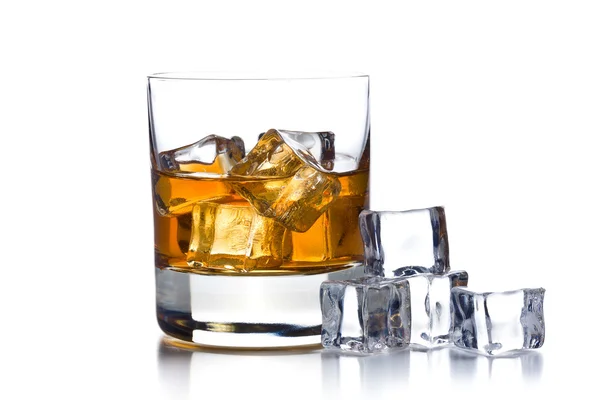 Whiskey with ice in glass — Stock Photo, Image