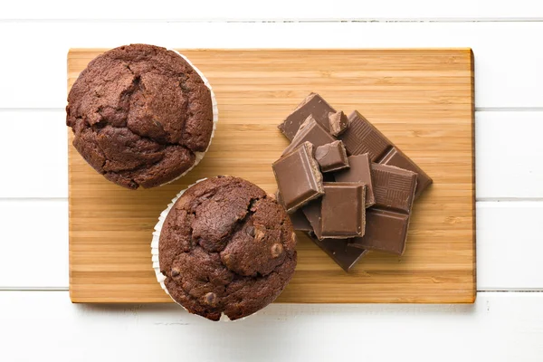 Top view of chocolate and muffin — Stock Photo, Image
