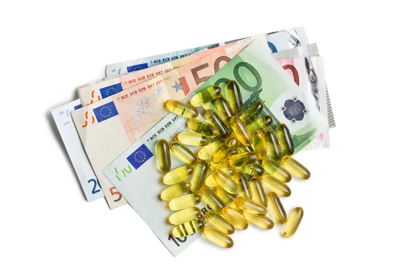 Cod liver oil. Gel capsules with euro currency — Stock Photo, Image