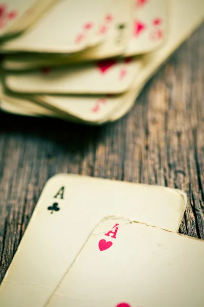 Old cards on wooden table — Stock Photo, Image