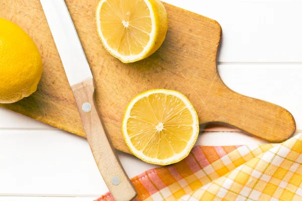 Fresh lemon on kitchen table — Stock Photo, Image