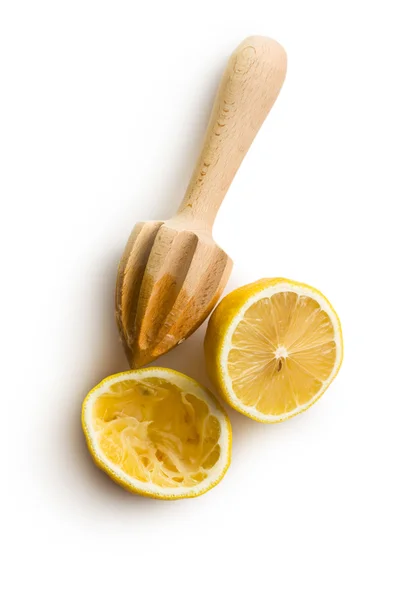 Squeezed lemon fruit and citrus reamer — Stock Photo, Image