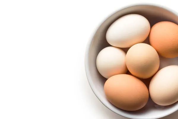 Chicken eggs in bowl — Stock Photo, Image