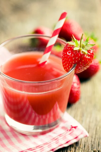 Strawberry juice in glass — Stock Photo, Image