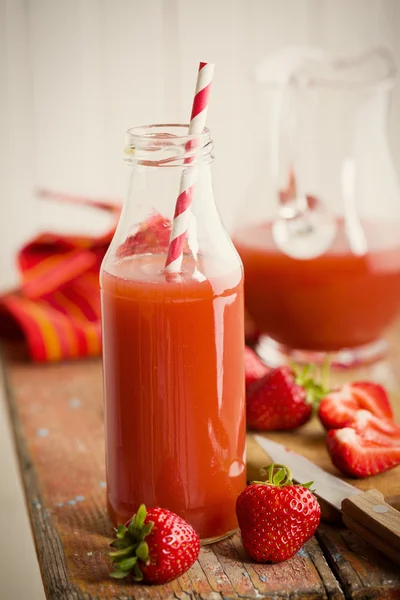 Strawberry juice in glass — Stock Photo, Image