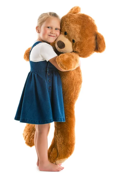 Kleines Mädchen mit großem Teddybär — Stockfoto