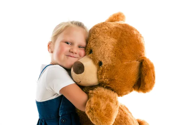 Little girl with big teddy bear — Stock Photo, Image