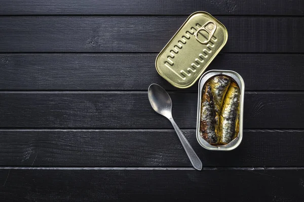 Canned Sardines Sea Fish Tin Can Black Table Top View — Stock Photo, Image