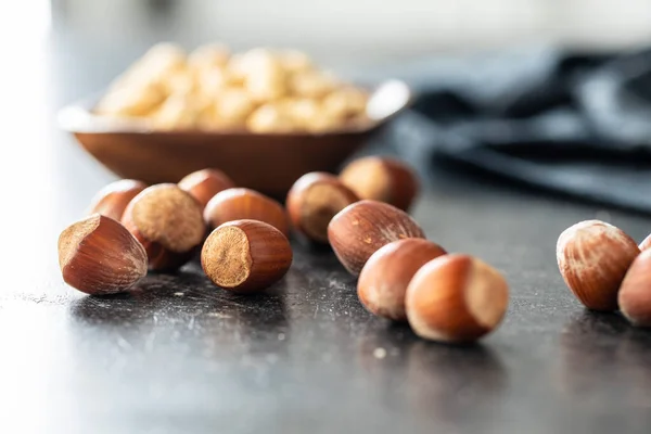 Unpeeled Roasted Hazelnut Kernels Black Table — Stock Photo, Image