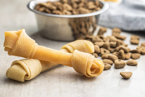 Delicacy Dogs Chewing Bone Dried Food Dog Gray Background — Stockfoto