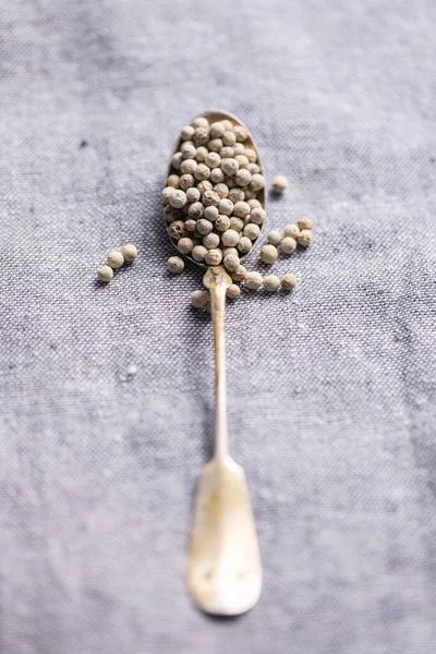 Whole Pepper Spice White Peppercorn Grain Spoon Tablecloth — Stock Photo, Image