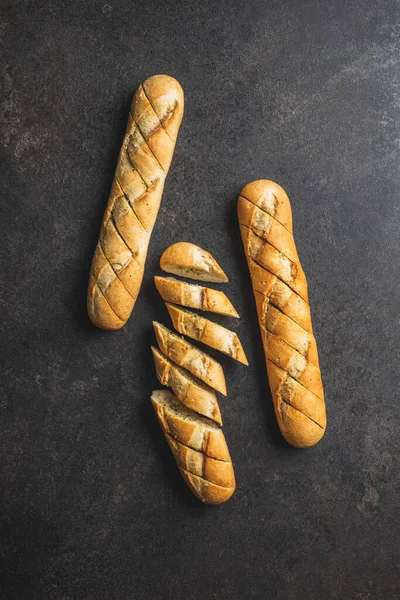 Roasted Baguette Garlic Butter Crunchy Sliced Garlic Bread Black Table — Stock Photo, Image