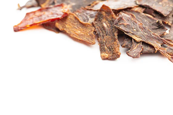 ビーフジャーキー肉 白い背景に隔離された干物 — ストック写真