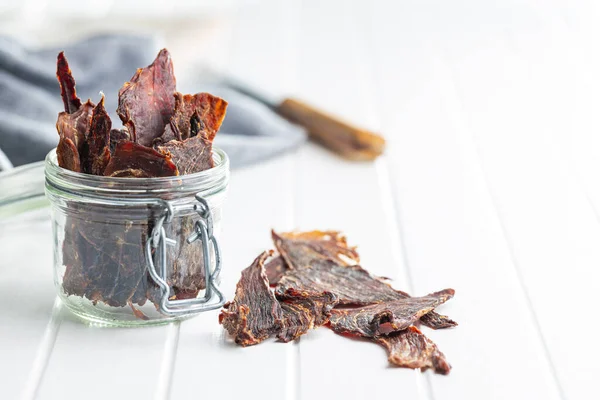 Beef Jerky Meat Dried Sliced Meat White Table — Stock Photo, Image