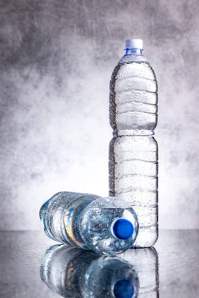 Two Plastic Cold Bottles Water Water Drops — 图库照片