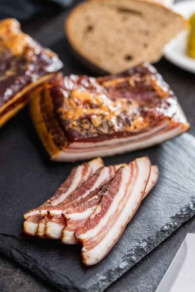 Whole Sliced Smoked Bacon Black Table — Foto de Stock