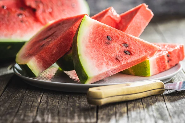 Slices Red Watermelon Plate Wooden Table Stockfoto