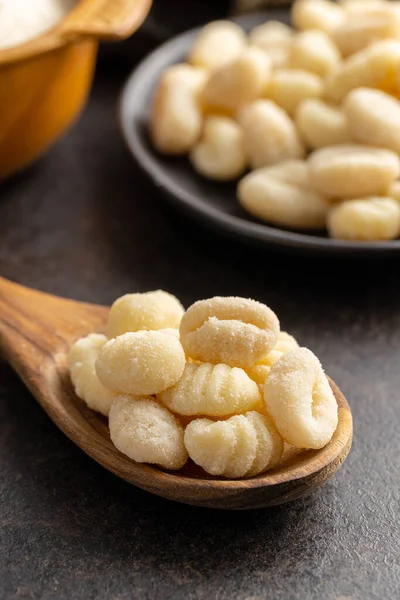 Uncooked Potato Gnocchi Wooden Spoon Tasty Italian Food — Stockfoto