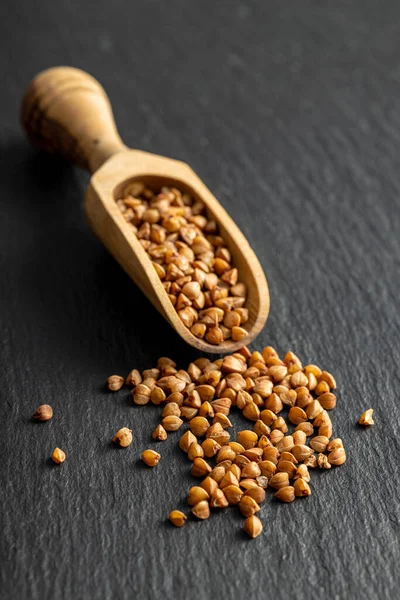 Uncooked Buckwheat Grain Wooden Scoop — Stock Photo, Image